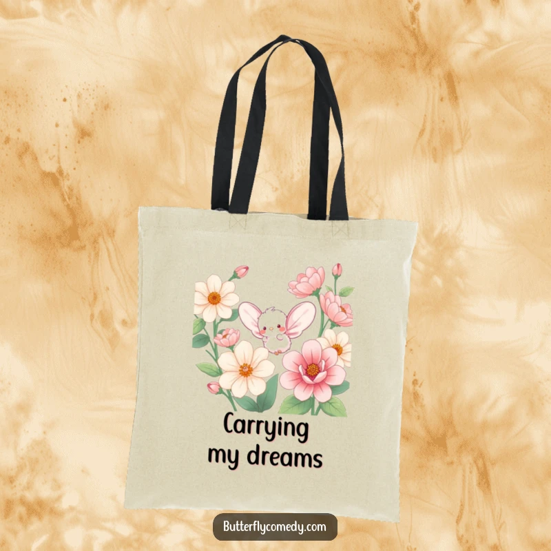 Funny tote bag depicting a small, fluffy creature with large wings, joyfully fluttering amongst oversized, colorful flower blossoms.