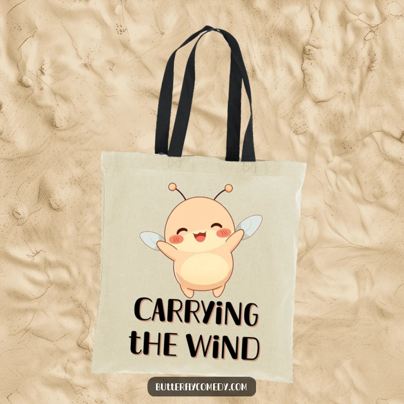 Funny tote bag showcasing a happy, plump creature with antennae wiggling joyfully while being lifted by a gentle breeze.